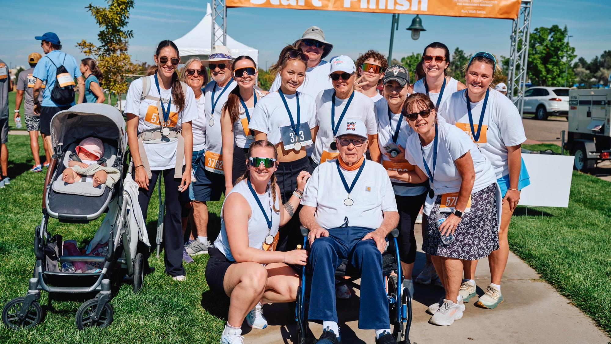 A group of run/walk participants in a park
