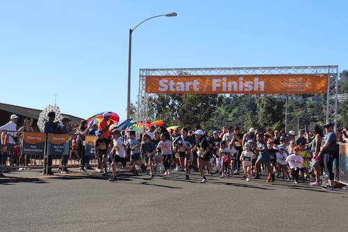 A large group of children participating in the Run/Walk