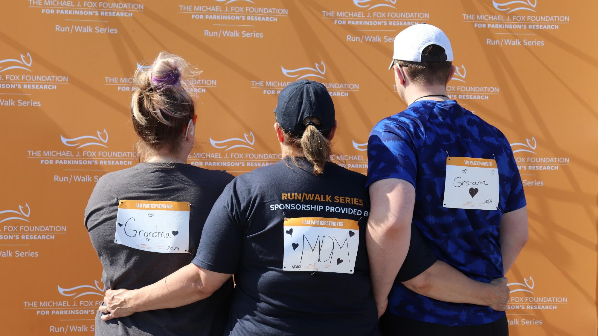 Family hugging at a Run/Walk event