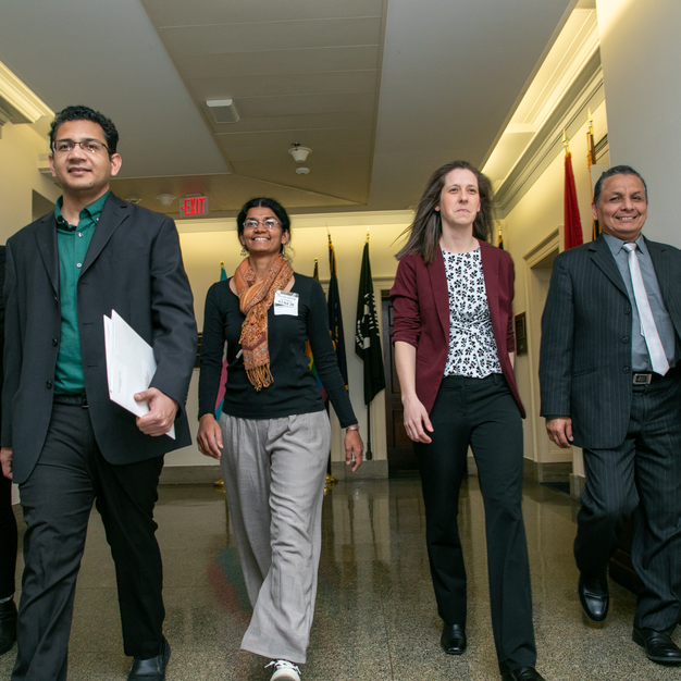 people walking in a building