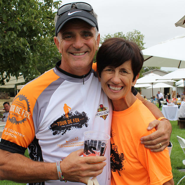 Male and female at a Tour de Fox event smiling for camera.