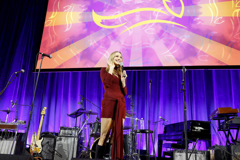 Nikki Glaser performs onstage. 