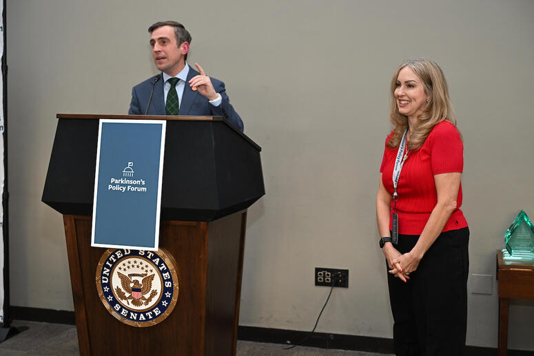 Dan Feehan presents award to Esther