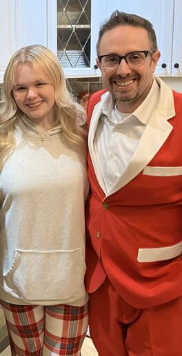 Bryan Roberts in a Santa "suit" with his daughter, Avery. 