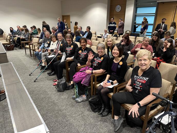Minnesota advocates prepare to testify for the state's proposed paraquat ban.