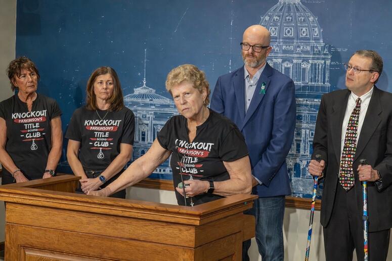Patient advocate Roberta Niver speaks at a press conference in support of Minnesota's paraquat ban legislation.