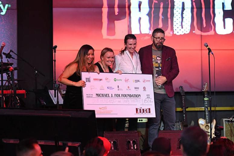 MJFF team on stage at charity concert