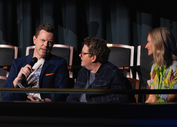 Michael J. Fox and Debi Brooks give remarks alongside Willie Geist at the 2026 "A Country Thing Happened on the Way to Cure Parkinson's" fundraiser. 