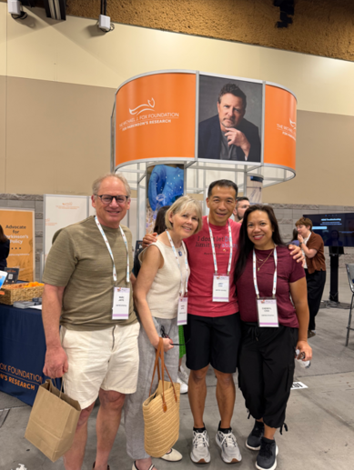 MJFF Patient Council members in front of the Foundation's booth. 