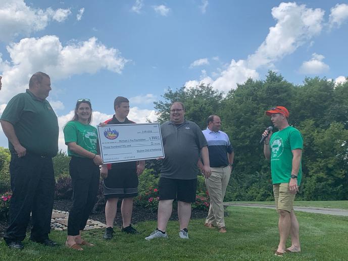 Skyline presenting a check at Breaking Parkinson's