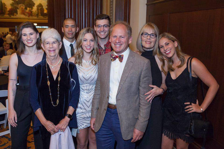 Group of people smiling for camera at Team Fox's MVP Awards Dinner.