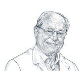 Man smiling wearing a light shirt/ jacket and glasses