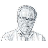 Man smiling while wearing glasses and white collared shirt