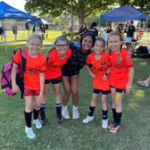 Rianna and young soccer players