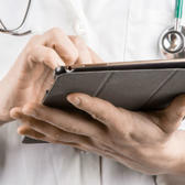 doctor with tablet