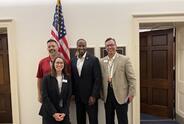 From left to right: Marine Corps veteran Rich Pointe, Kristin Rossi of the Michigan Parkinson Foundation, Representative John James (R-MI-10) and Marine Corps veteran Nate Jolliff at the 2025 Parkinson's Policy Forum on Capitol Hill.