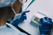 Scientist examining samples