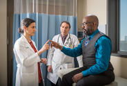 Doctor and patient in office.