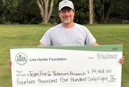 David and a check for Live Harder