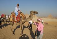 Mona Dewart on a camel