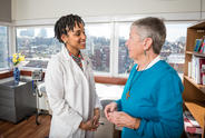 Health care professional and person in a room