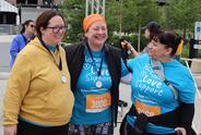 Stacey Empson Stands With Two Friends at Run/Walk Finish Line