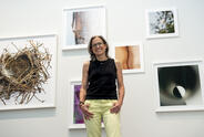Torrance York posing with her work