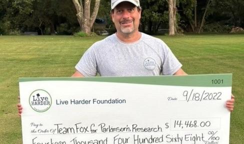 David and a check for Live Harder