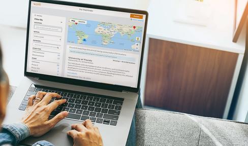 Person on a laptop using Fox Trial Finder.