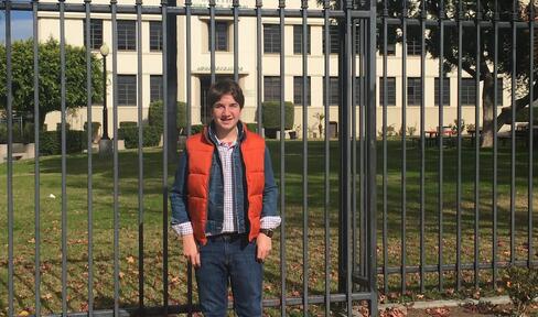 Ari Turobiner pictured in front of the high school used in the original Back to the Future film.