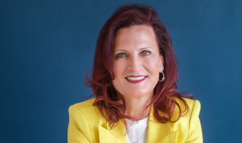 A woman smiling.