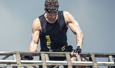 Steve Yellen on an obstacle course element.