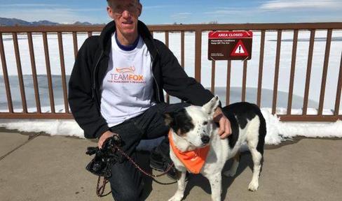 Team Fox Member John Gartling with his dog.