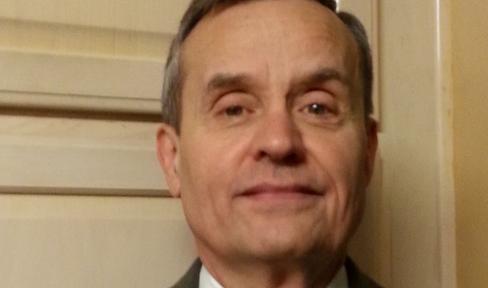 Man smiling at camera.