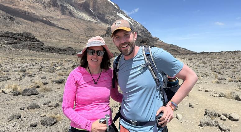 Tasha and Nathan climbing Mt. Kilimanjaro