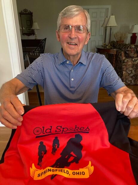 Ed Leventhal with swag from his local cycling group.