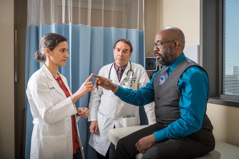 Doctor and patient in office.