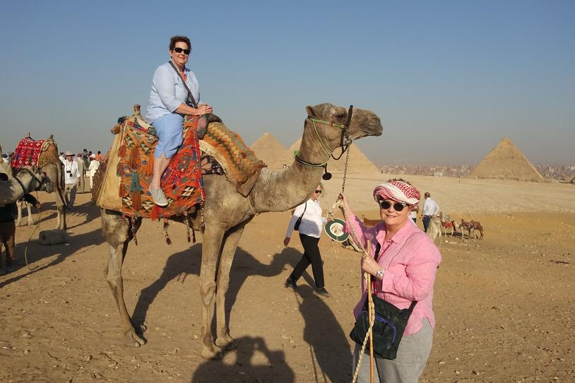 Mona Dewart on a camel