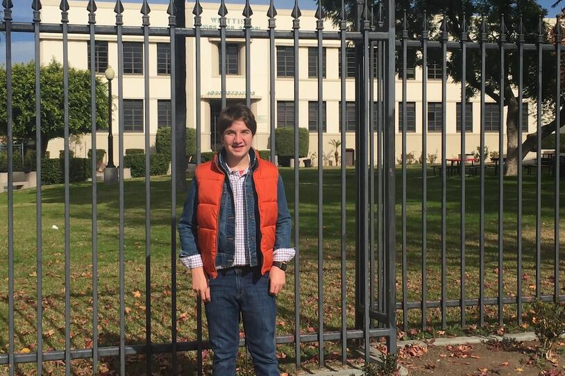 Ari Turobiner pictured in front of the high school used in the original Back to the Future film.