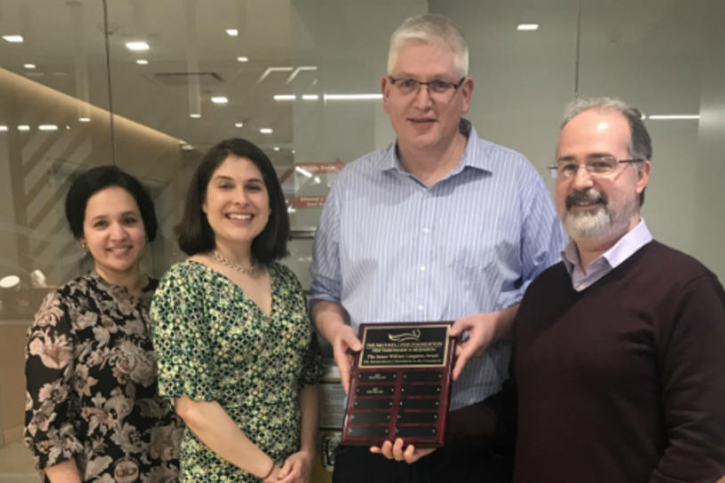 Dr. Dario Alessi celebrates his 2018 J. William Langston Award with MJFF staff who work on the LRRK2 portfolio.