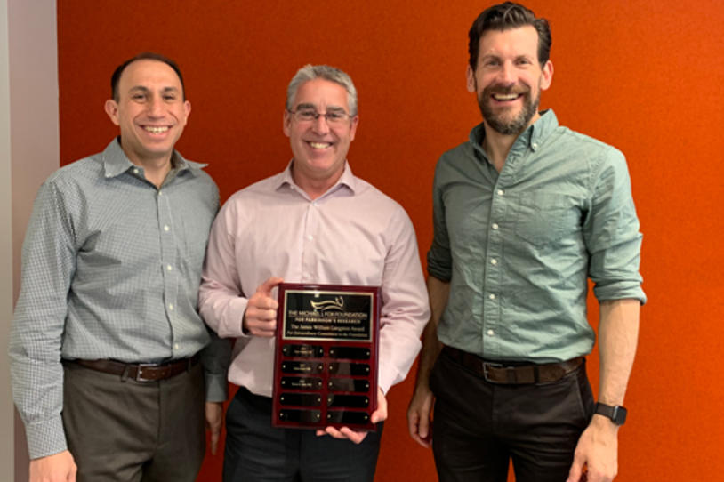 Dr. Warren Hirst was recognized with our 2018 J. William Langston Award by MJFF CEO Dr. Todd Sherer and SVP of Research Programs Dr. Brian Fiske.