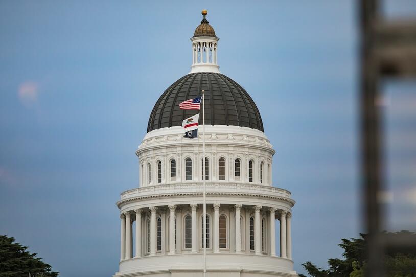A photo of the top of the California State Capitol building