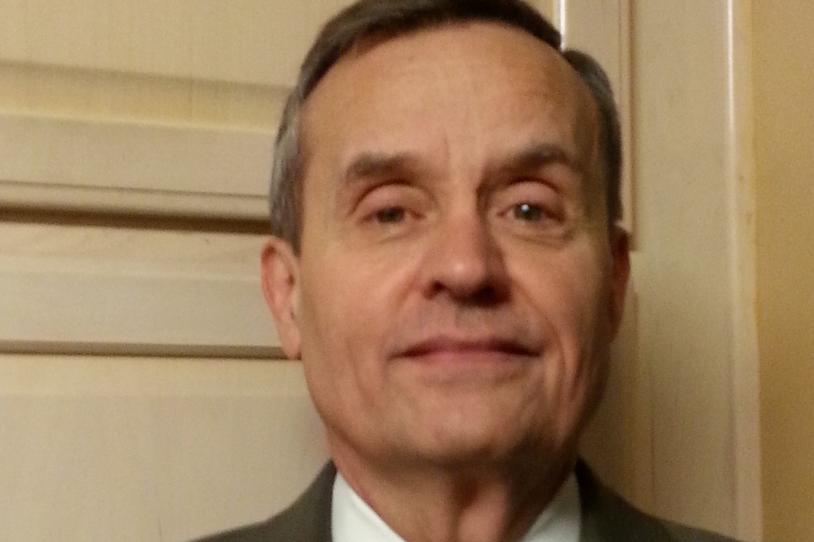 Man smiling at camera.