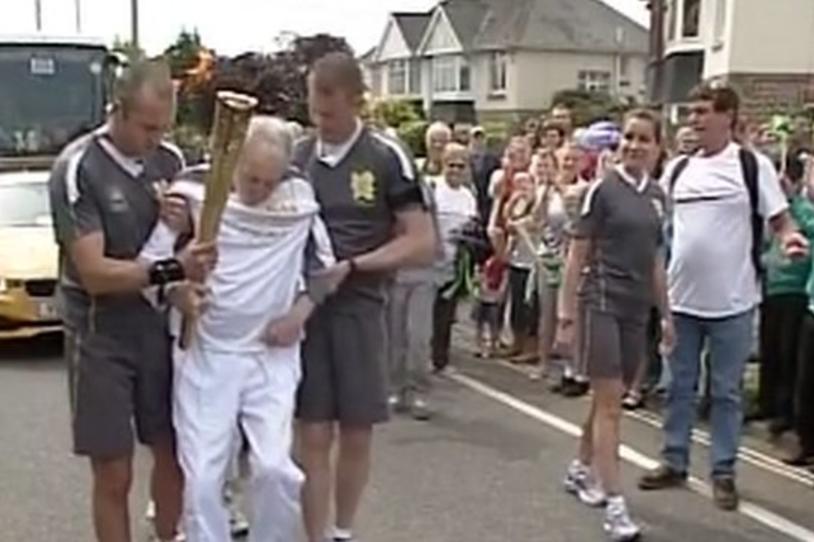 Leaving His Wheelchair Behind to Participate in Olympic Torch Relay