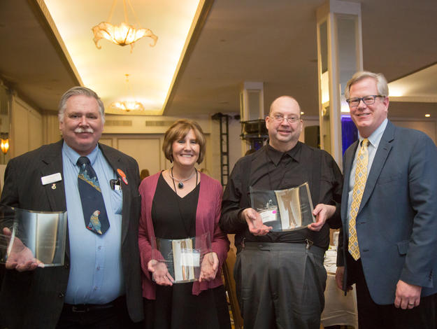 MJFF Senior Vice President of Public Policy, Ted Thompson, congratulates Kevin Mansfield, Leslie Peters and Charles Brown for their outstanding advocacy work (Year-Round Advocacy, Outstanding Advocacy and Social Media Advocacy, respectively) at the Policy Forum in Washington, D.C.