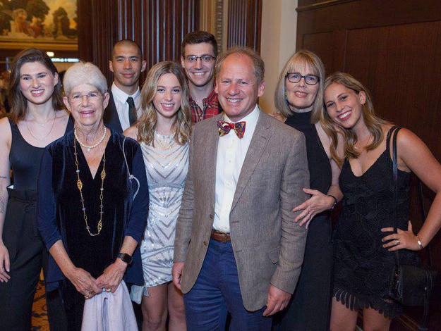 Group of people smiling for camera at Team Fox's MVP Awards Dinner.