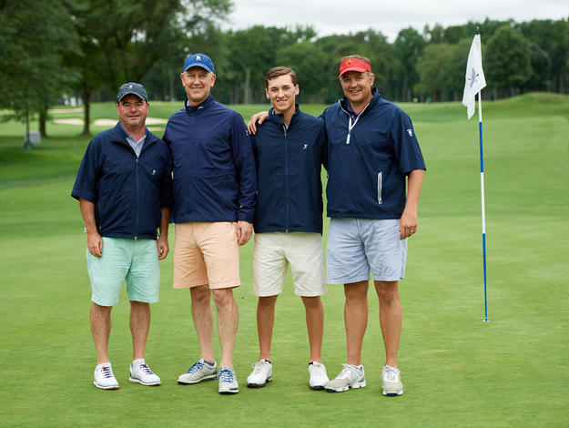 Four Caucasian male golfers at MJFF's Breaking Par fundraiser.