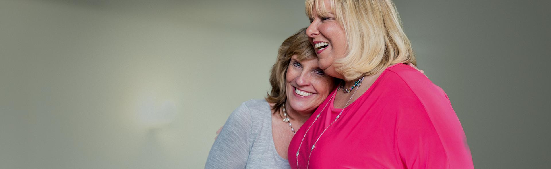 Two women hugging