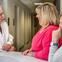 Doctor speaking to patients