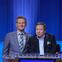 Harvey seated next to 'Jeopardy!' show host Ken Jennings. 